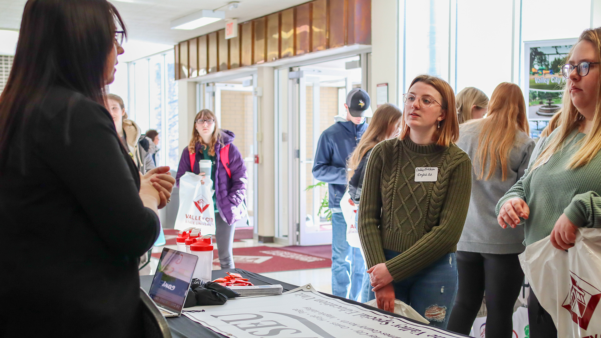 VCSU students visit with an employer at the 2024 career expo