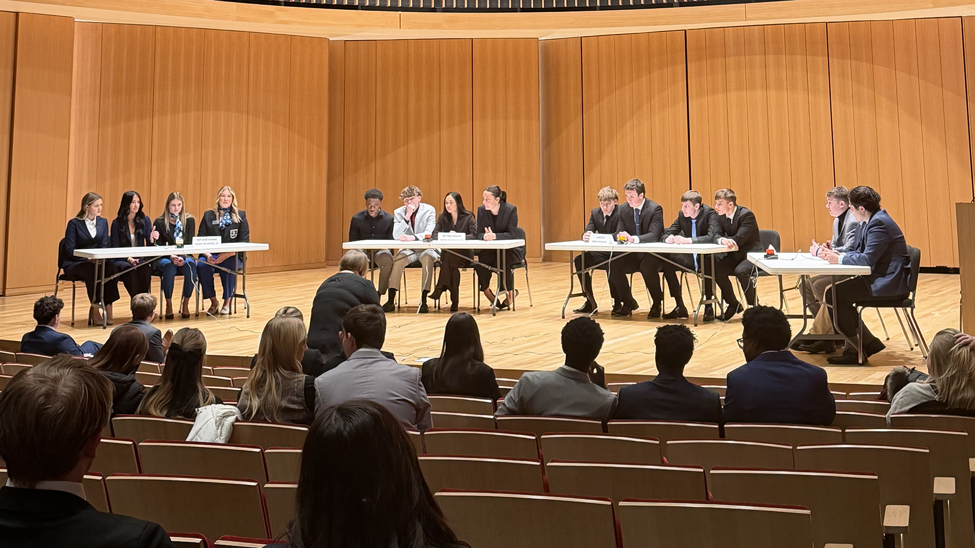 Students in teams of 4 compete in the Quiz Bowl