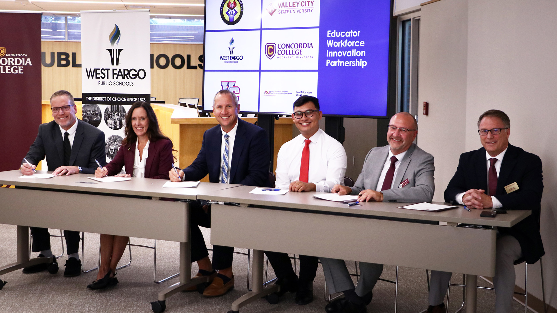 Education leaders sign agreements for a new partnership