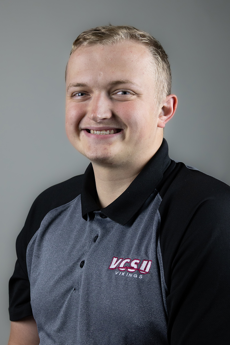 headshot photo of Jagger Dickman wearing a VCSU polo shirt