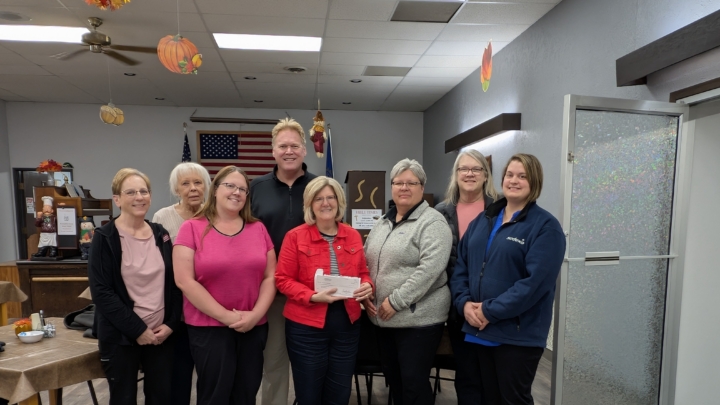 VCSU staff presenting check to food pantry