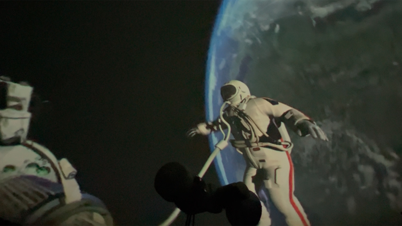 A video featuring an astronaut in space plays on the VCSU planetarium dome