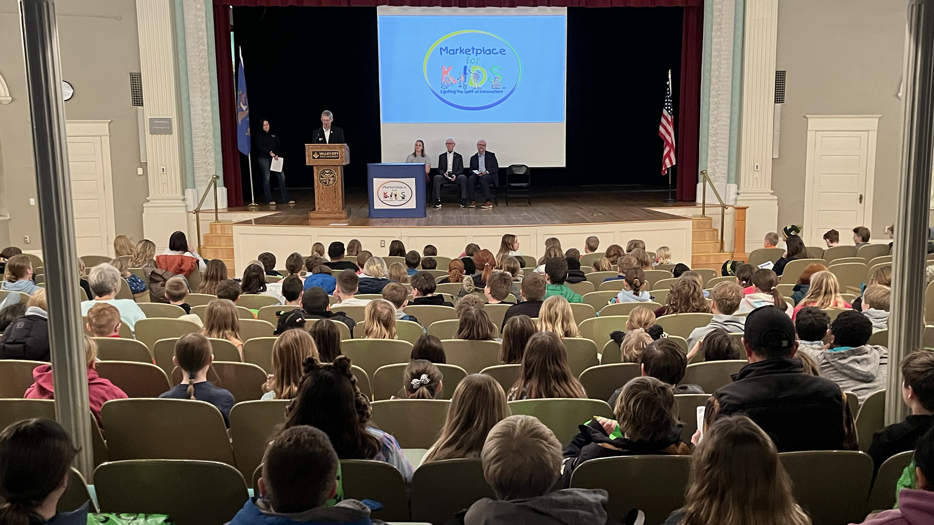 Students gather in Vangstad Auditorium during the Marketplace for Kids Event.