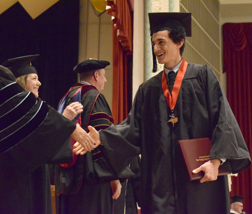 A graduate of VCSU receives his degree