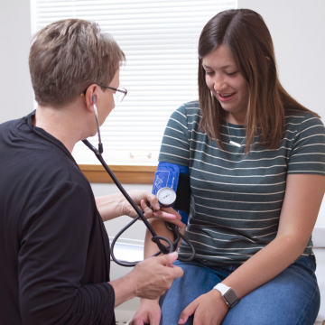 student and nurse at on campus