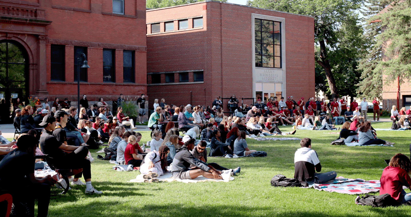 Students on the lawn at Valley City State University