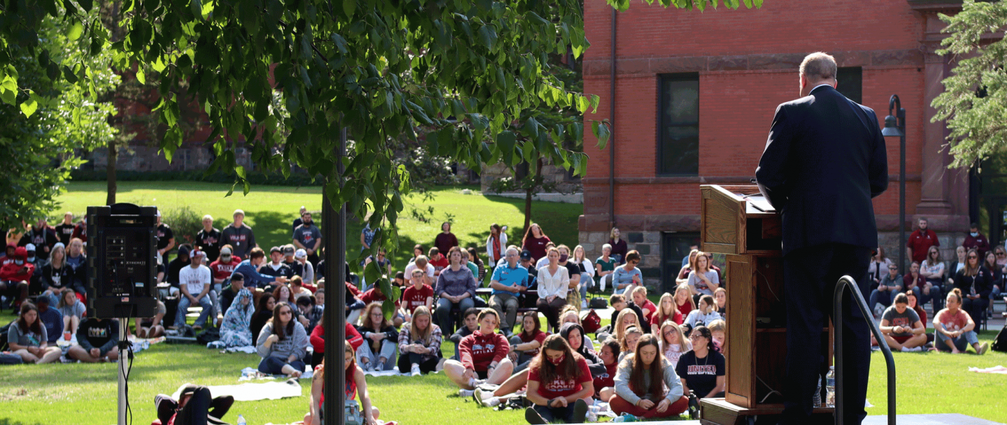 A photo of President Alan LaFave speaking at convocation