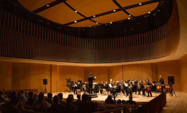 The VCSU Concert Band performs on stage during the Mid-Winter Instrumental Concert in the Center for the Arts.