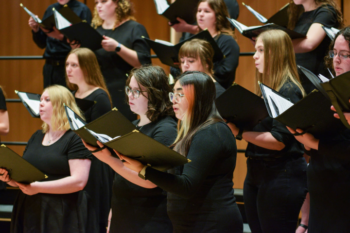 female choir students singing