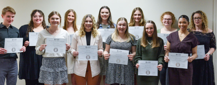 A group of VCSU students inducted into Psi Chi pose for a group photo. 
