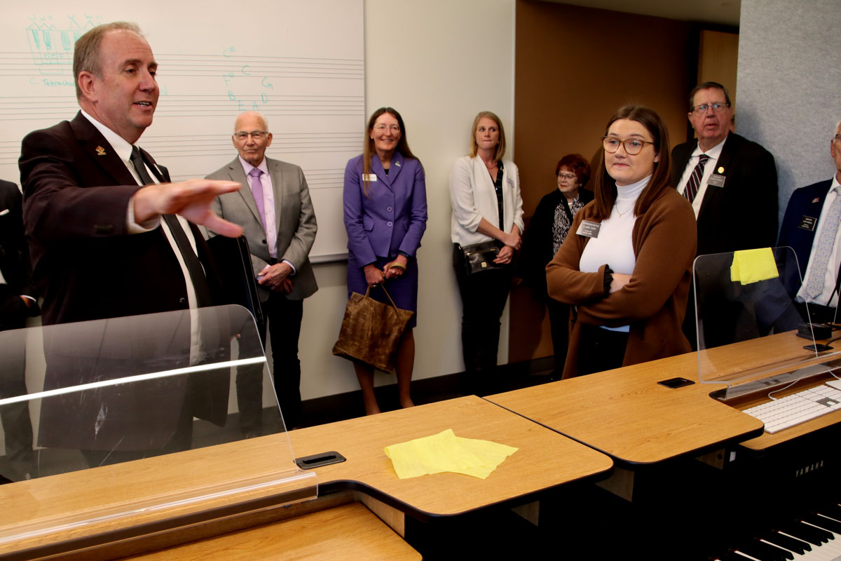 Members of the North Dakota Legislature visit the piano lab at Valley City State University. 