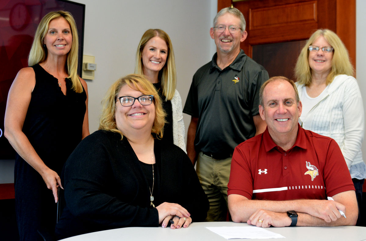 Members of VCSU and Minot State team signing a MOU for TIPSID