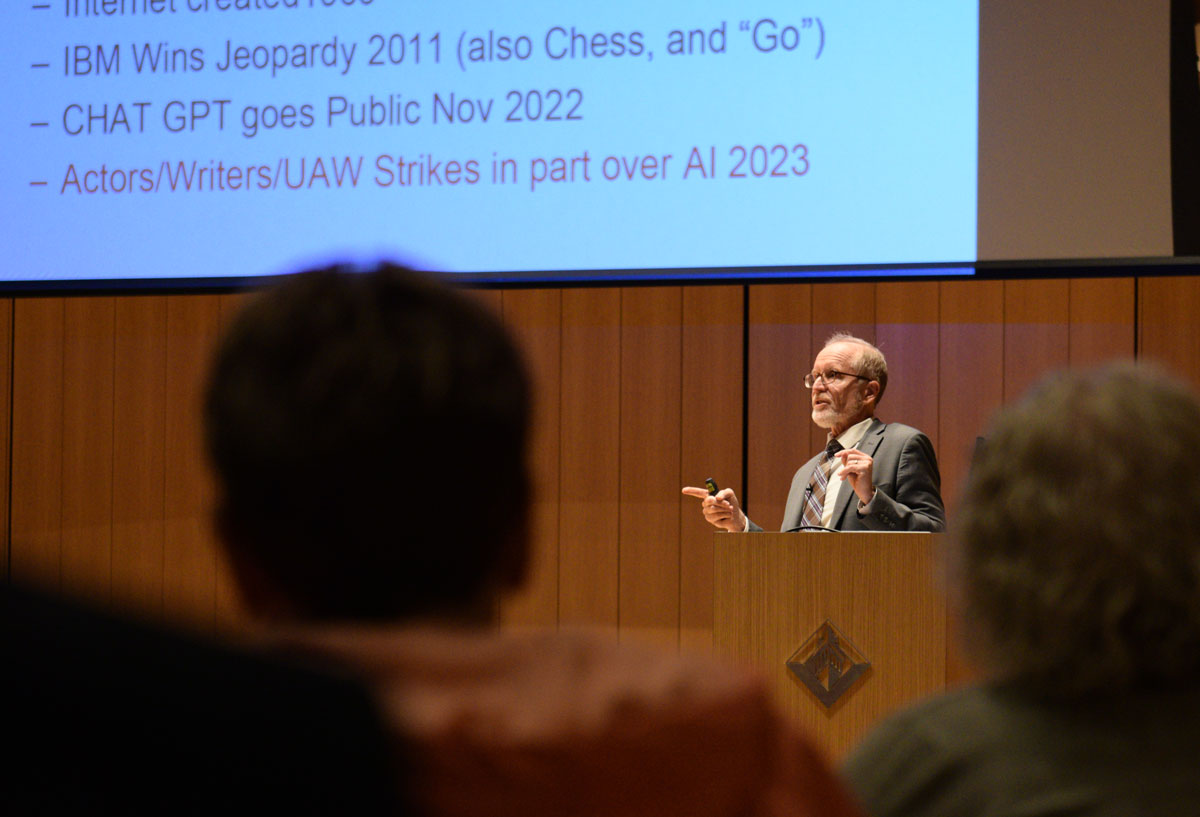 NDUS Chancellor Mark Haggerot presents about AI in the Robinson Center for the Arts