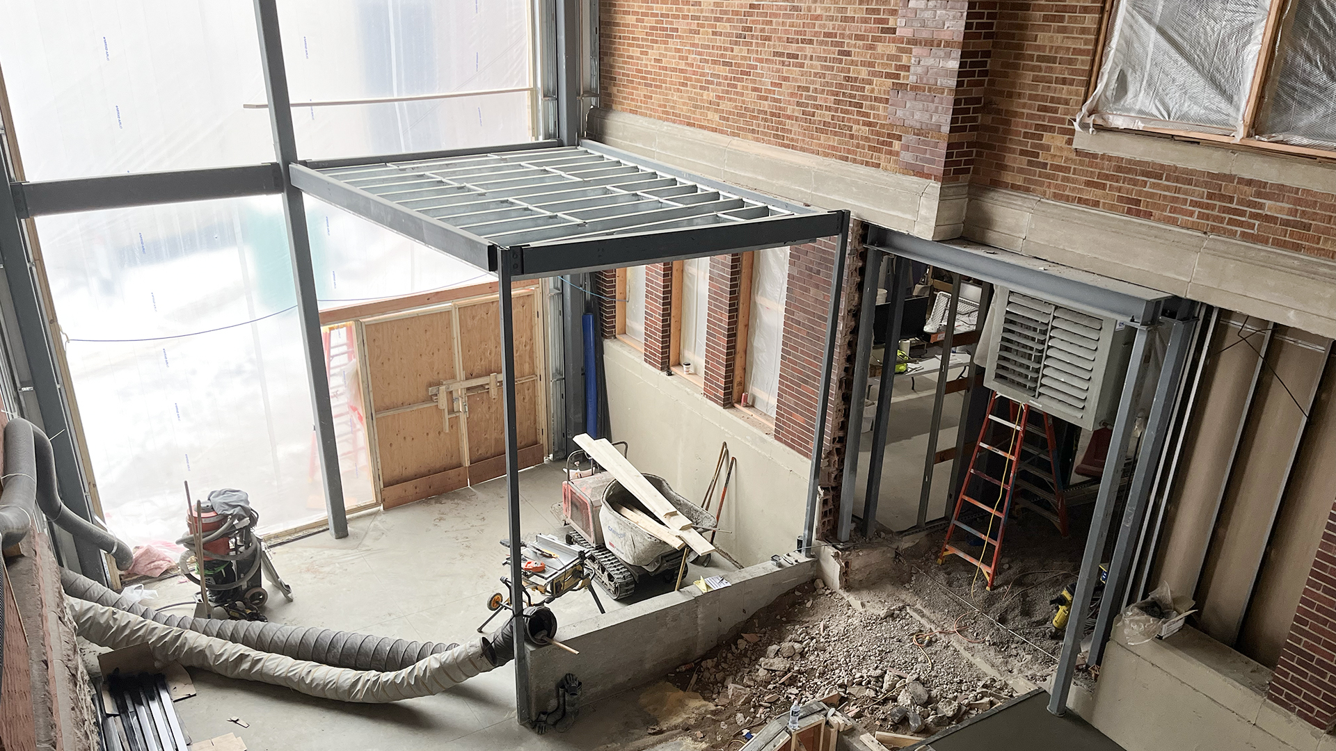 The new atrium between McCarthy and McFarland is framed in as work continues.