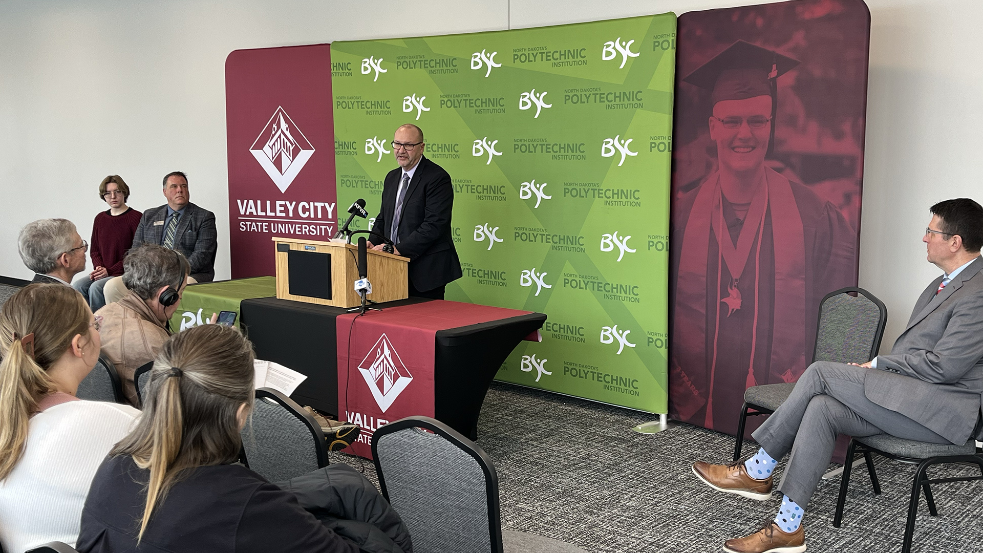 VCSU interim president Allen Burgad delivers remarks at a press conference