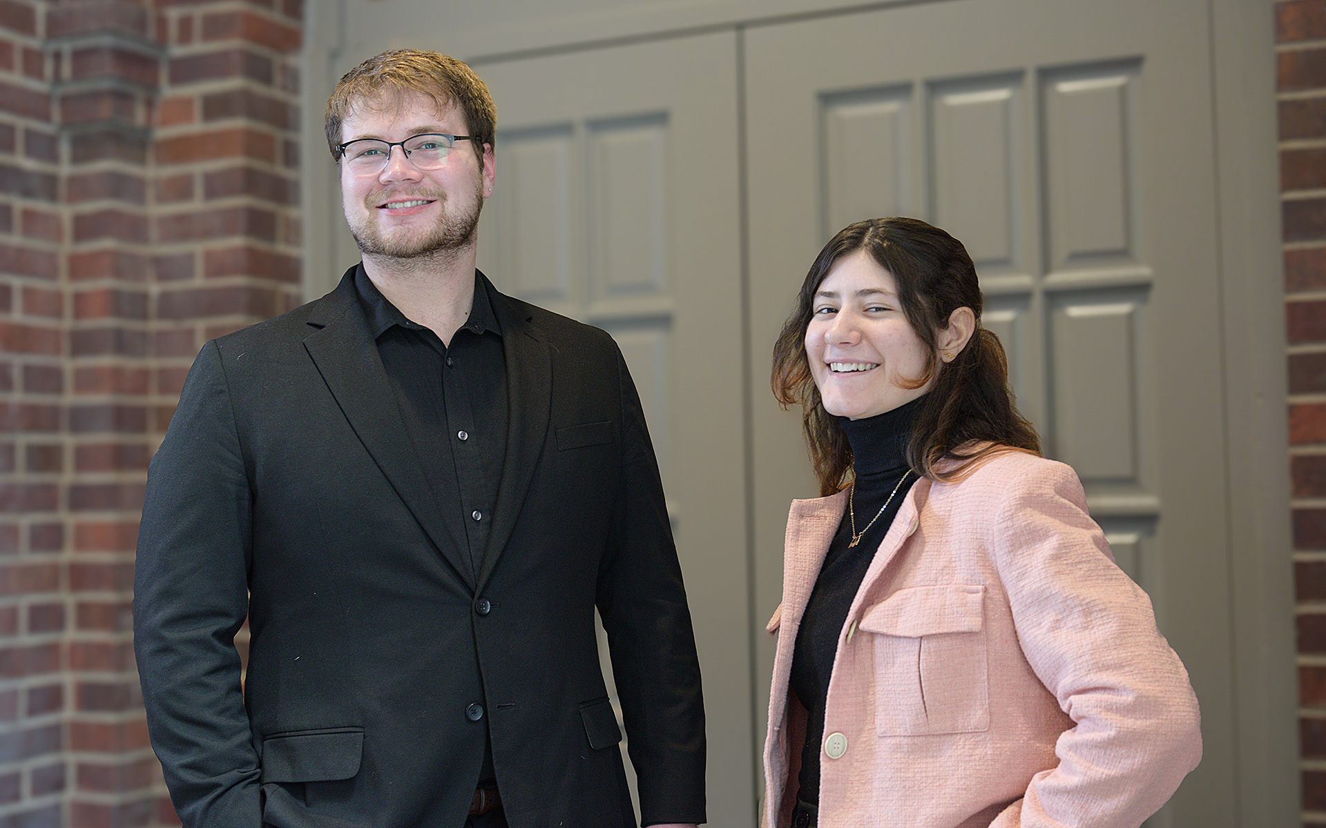 Grady Hornung and Anastasia Weber are pictured in professional clothes