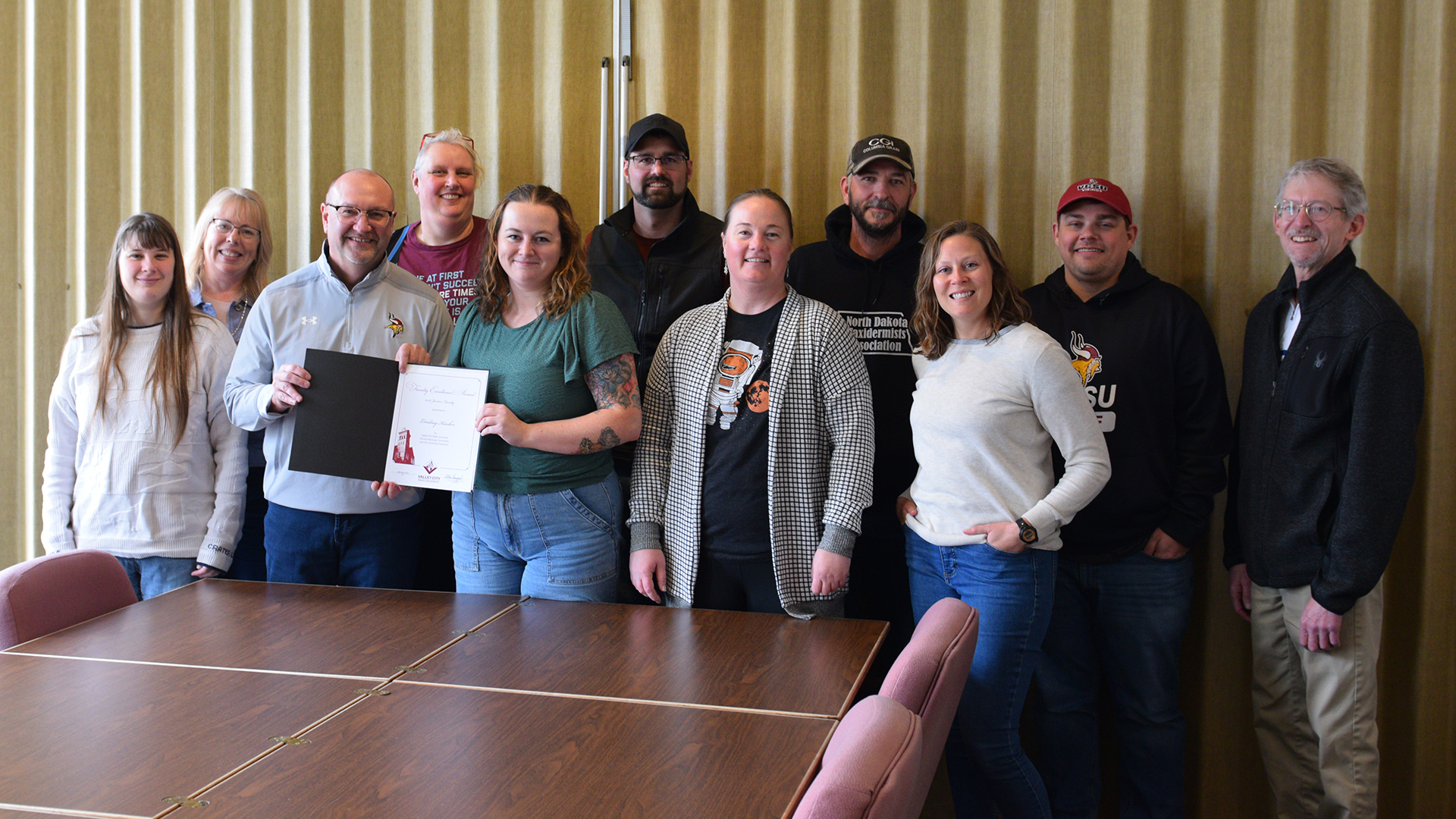 VCSU faculty Lindsey Kiecker is pictured with VCSU administrators and employees from the science department.