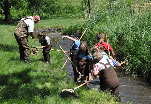 Stream exploration is a key component of the Prairie Waters Splashin' camp.