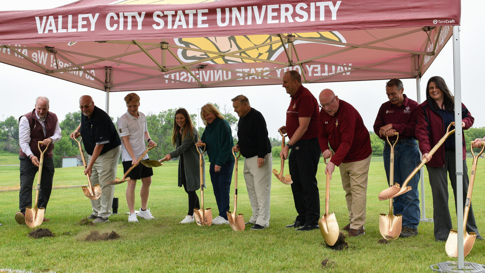 VCSU staff and donors sink shovels into ground and officially break ground on a new athletic facility.