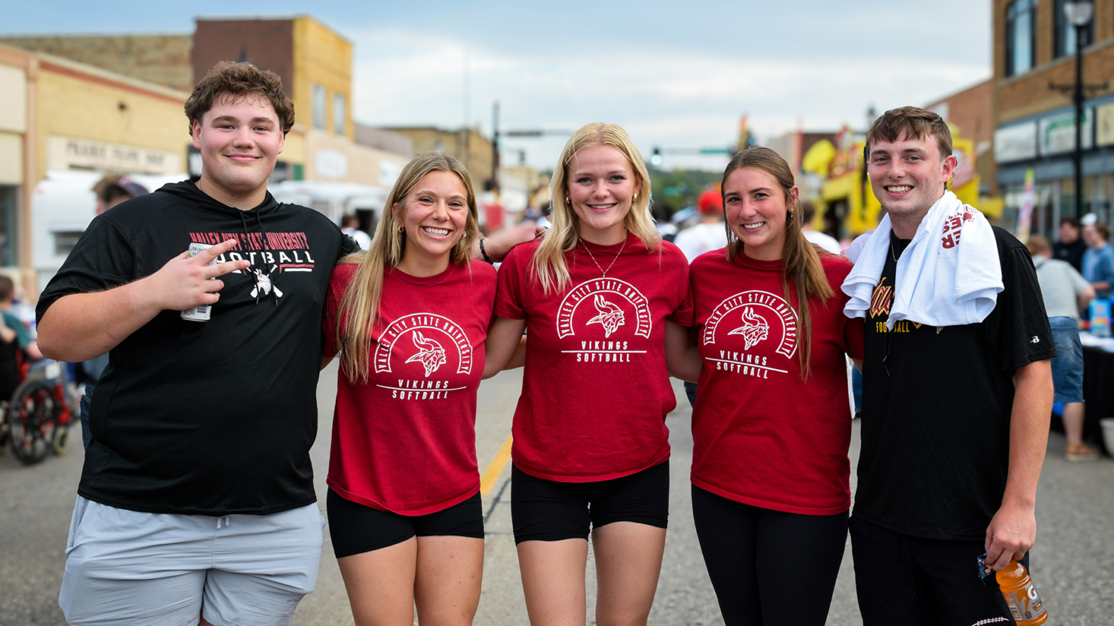 VCSU students smile for a photo while hanging out in downtown Valley City.