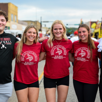 VCSU students smile for a photo while hanging out in downtown Valley City.