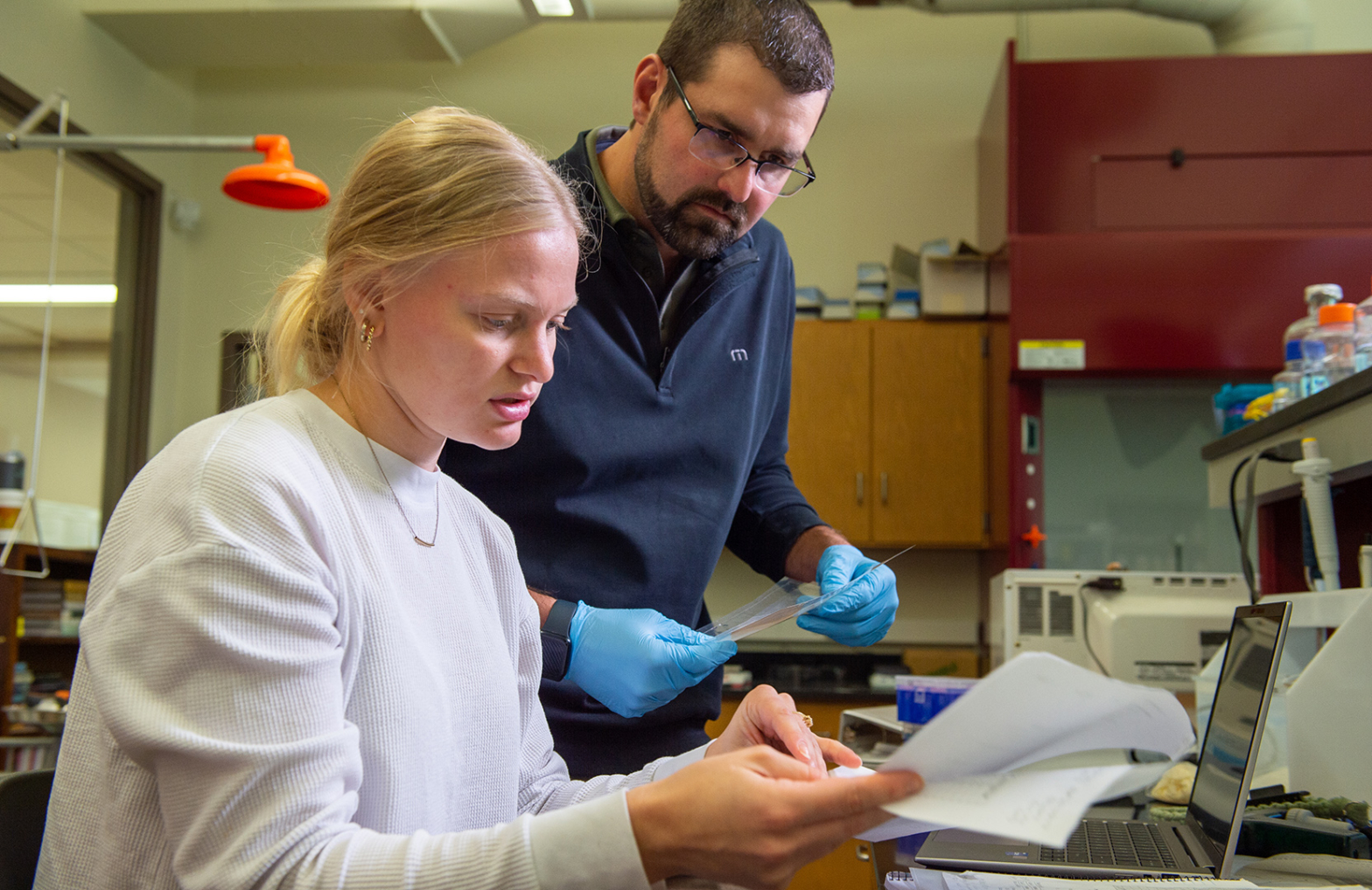 A VCSU student and faculty work together in a research lab on VCSU's campus.
