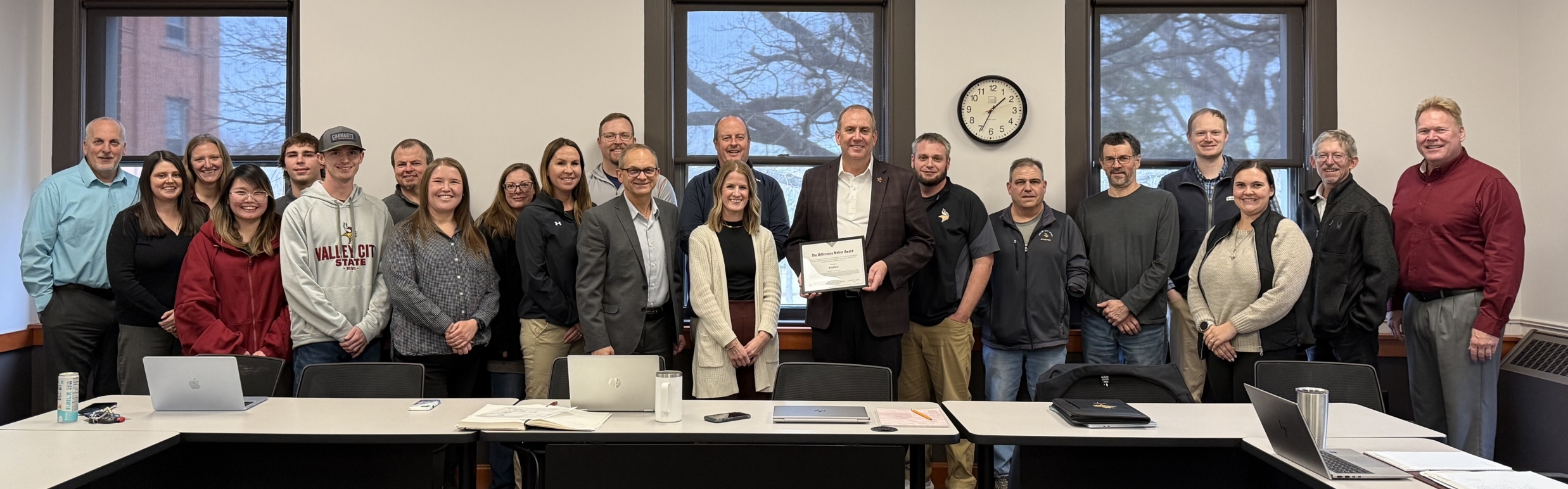 Al receiving award from colleagues