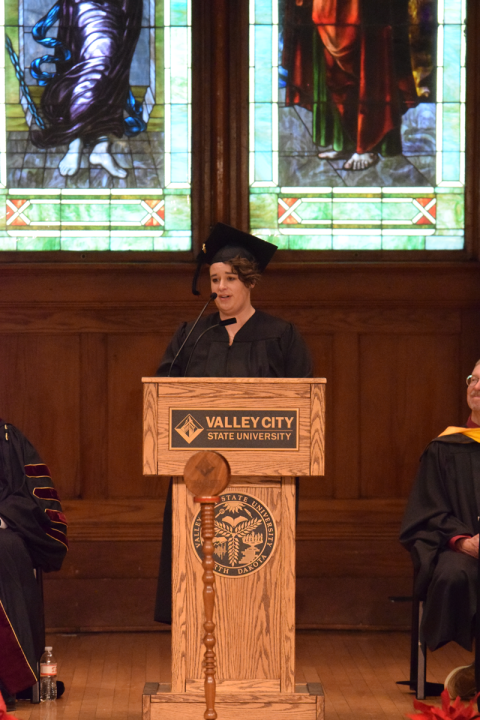 Student speaker Cora Potts addresses the crowd during Winter Commencement.