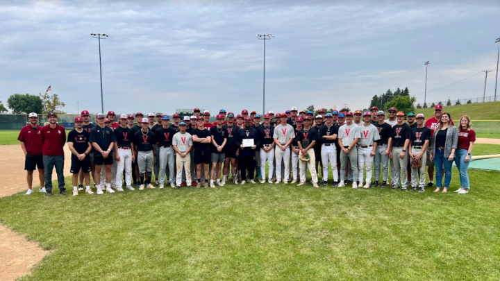 Thornhill posing with baseball team