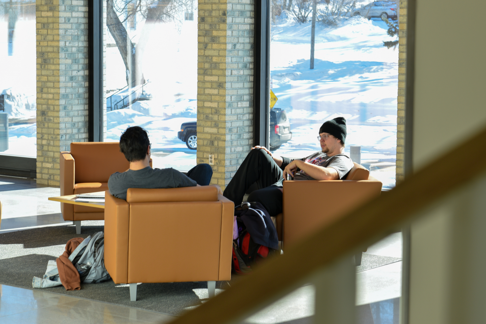 students sitting in the lobby area