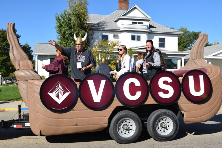 people riding on Viking Ship during parade