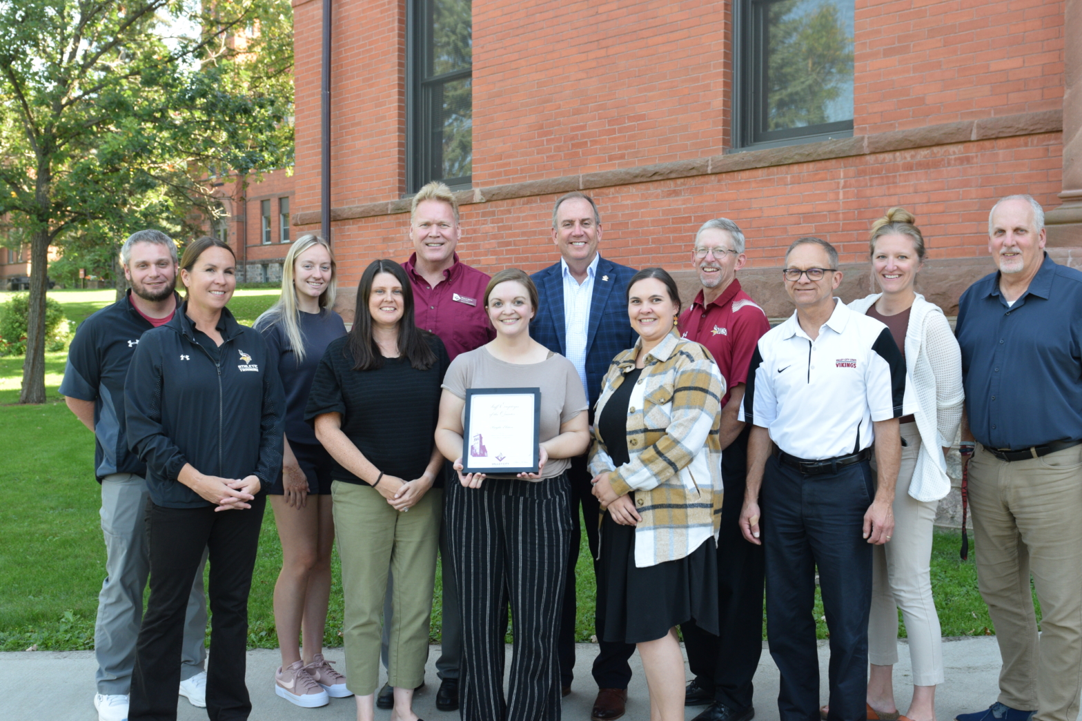 Kayla receiving award from Presidents Cabinet