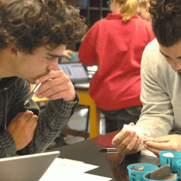 Two students work together in a rocks lab for Environmental Science