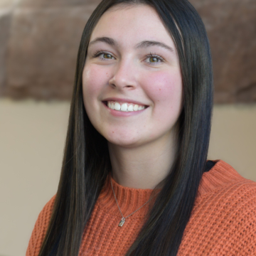 Photo of Alliana Freund smiling at the camera