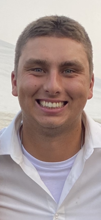 Photo of Grant Inniger smiling at the camera
