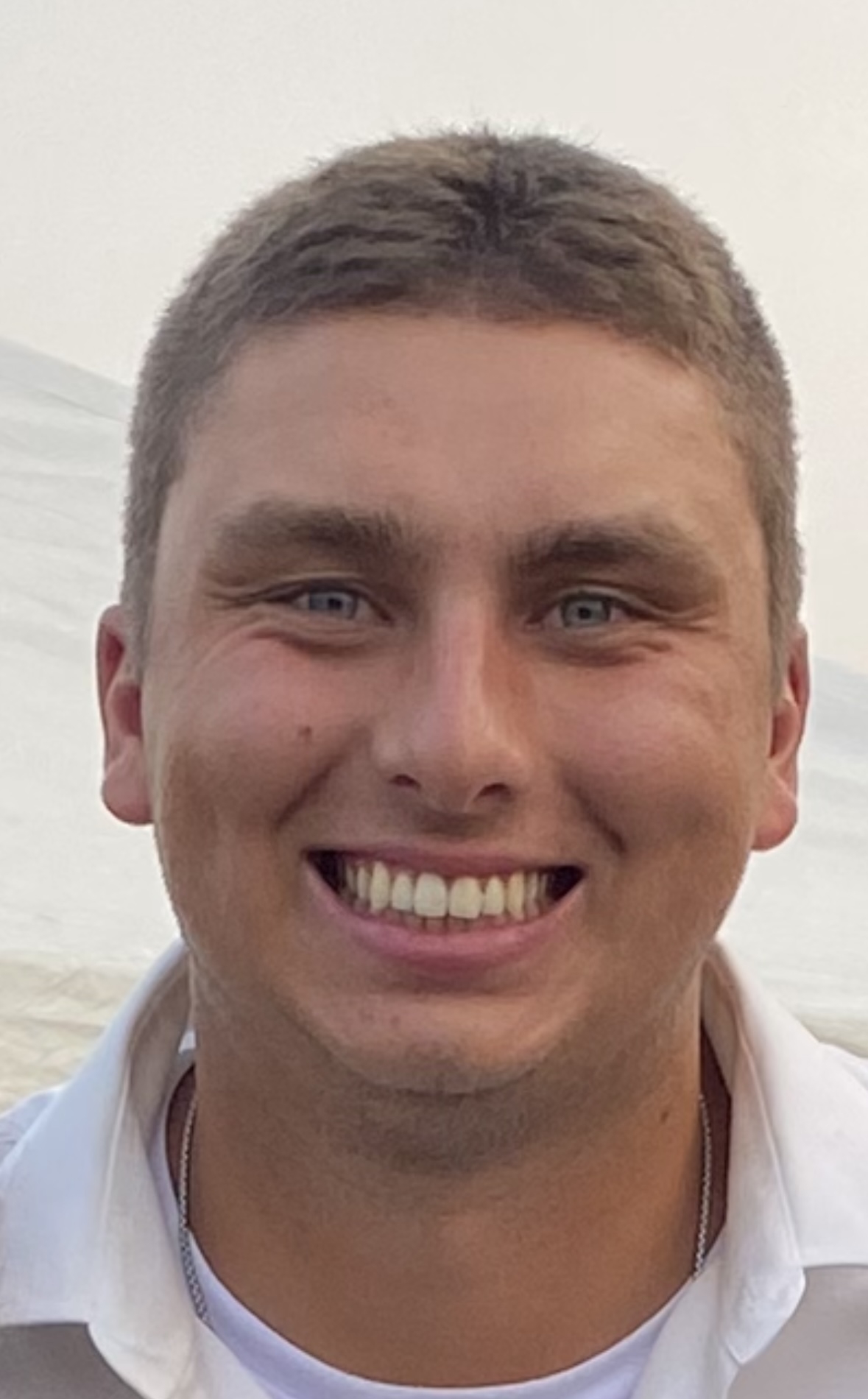 Photo of Grant Inniger smiling at the camera