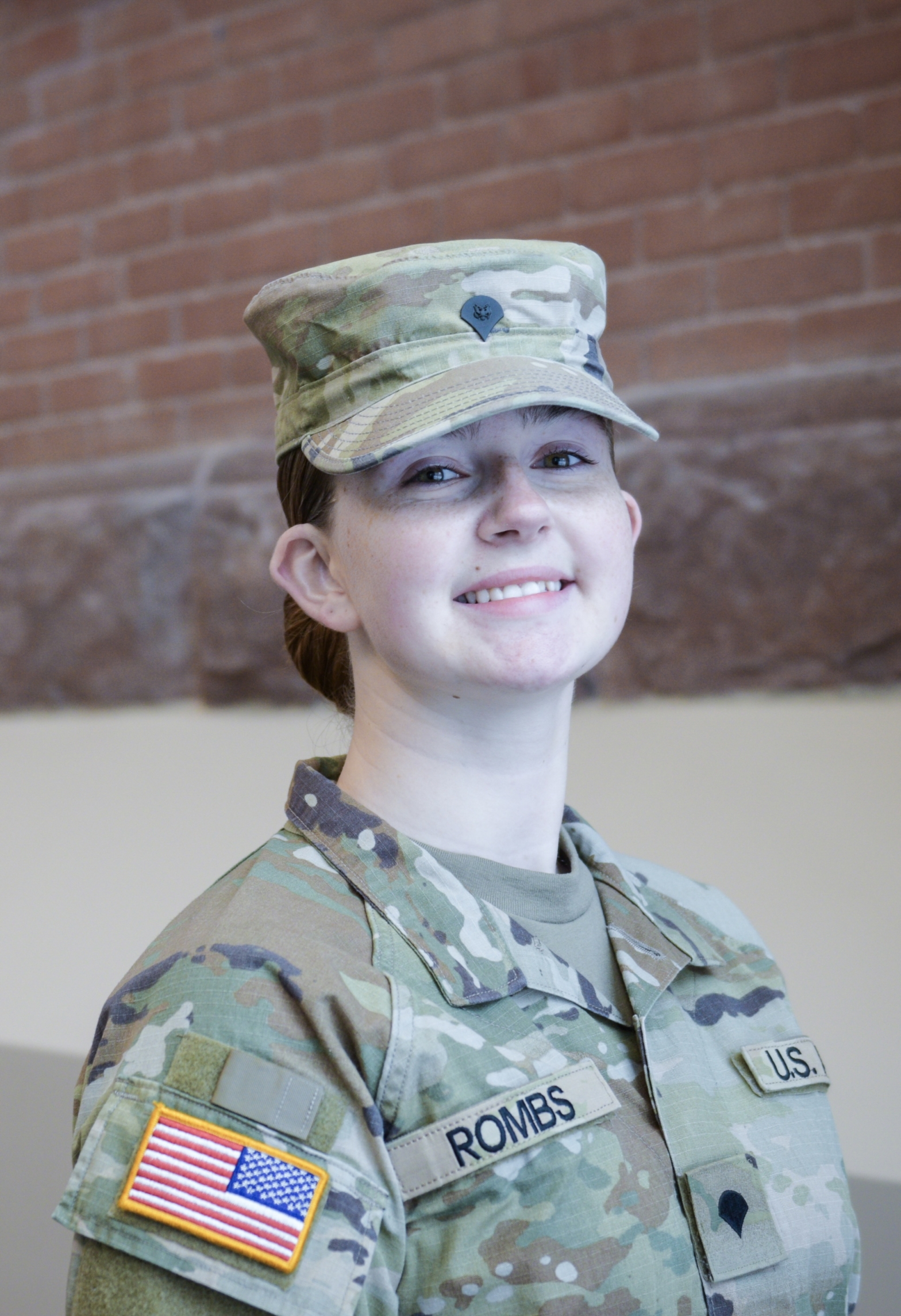 Photo of Jaydin Rombs smiling at the camera