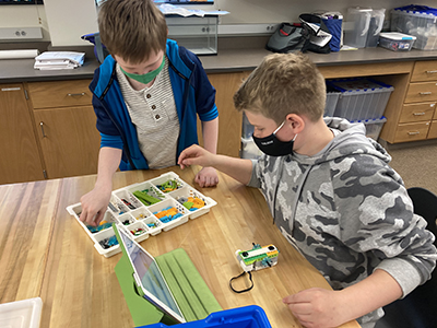 Students participating in Lego robotics