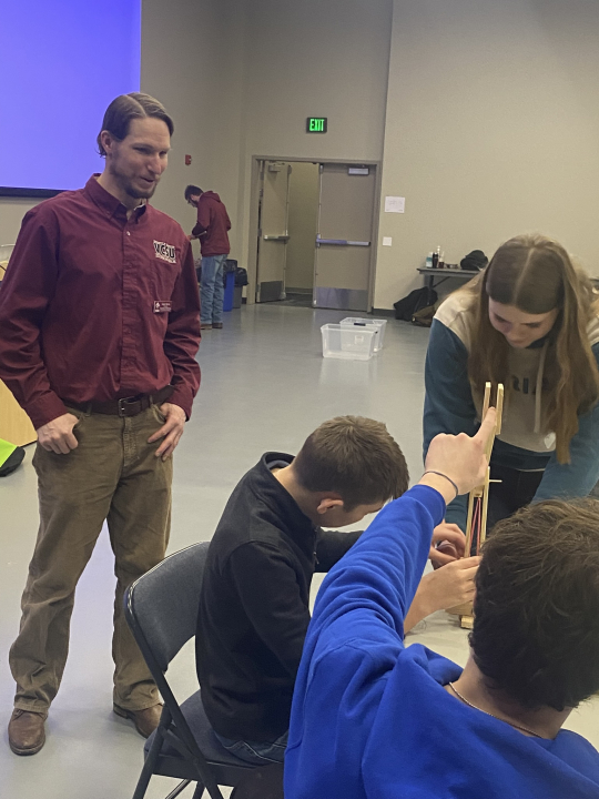 Clayton Mannie with STEM students