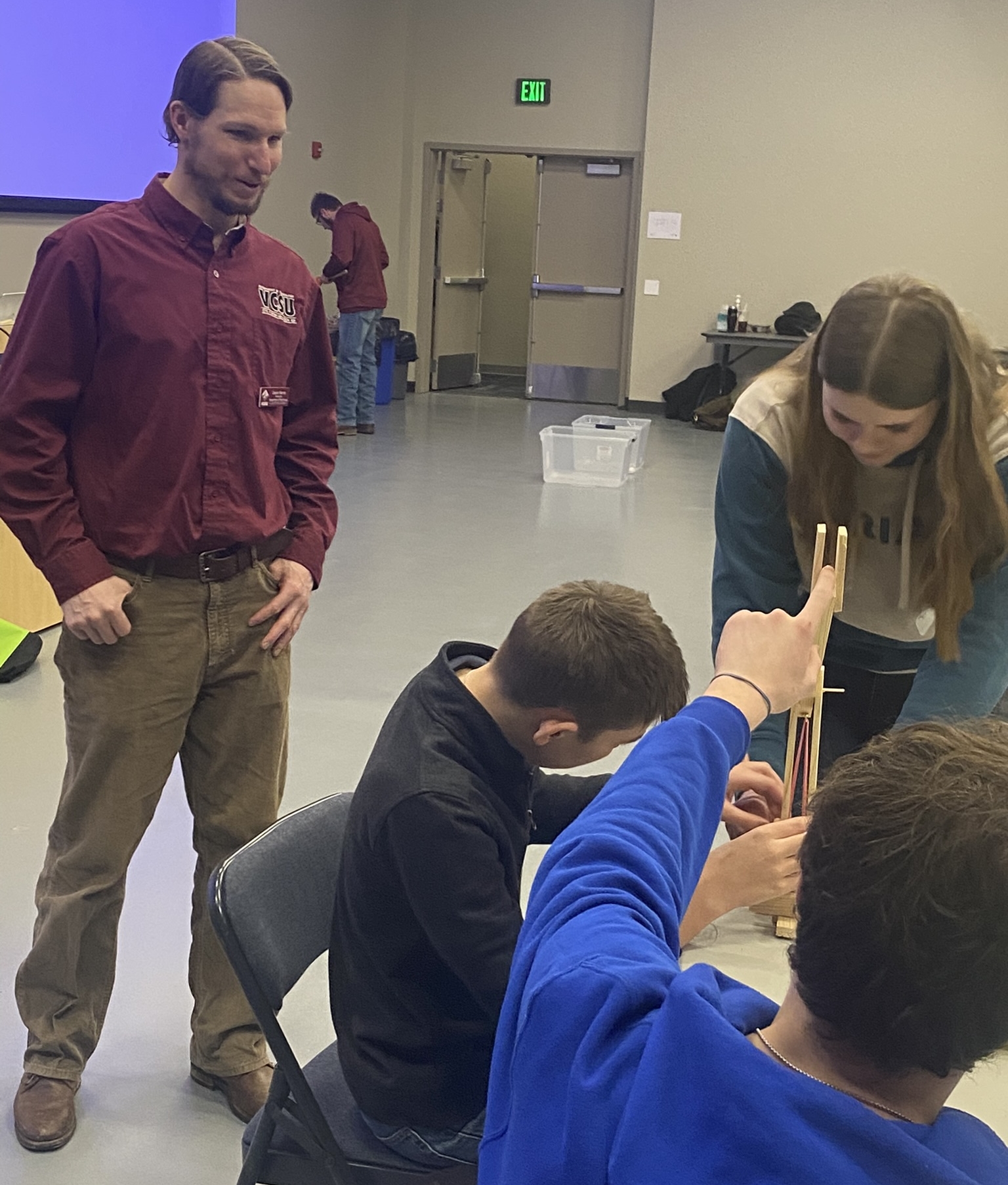 Clayton Mannie with STEM students