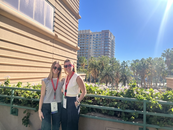 Janna Kohler and Heather Peschel standing outside of conference in Long Beach, CA