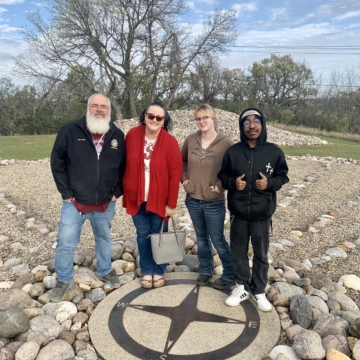 Family of four at Medicine Wheel Park