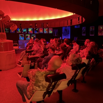 Families at a planetarium show