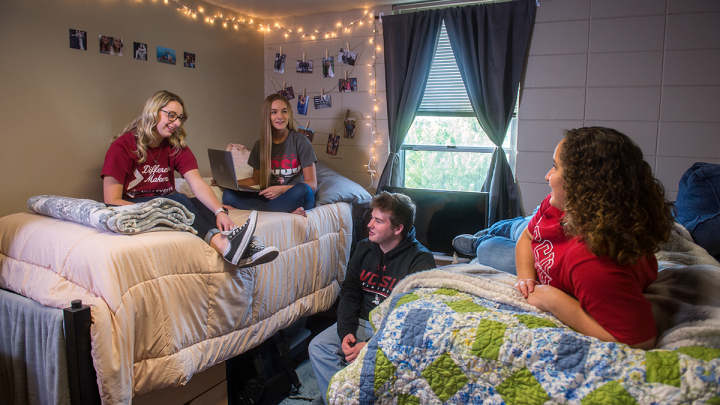 Snoeyenbos Hall dorm room with students