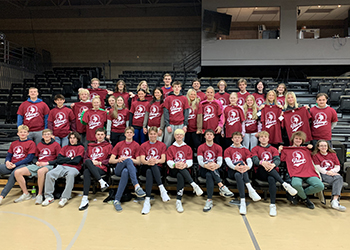 Oak Grove High School students take a picture wearing VCSU shirts