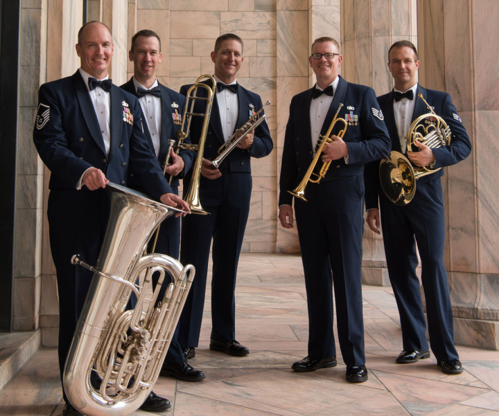 A picture of members of the Offutt Brass Band and their instruments.
