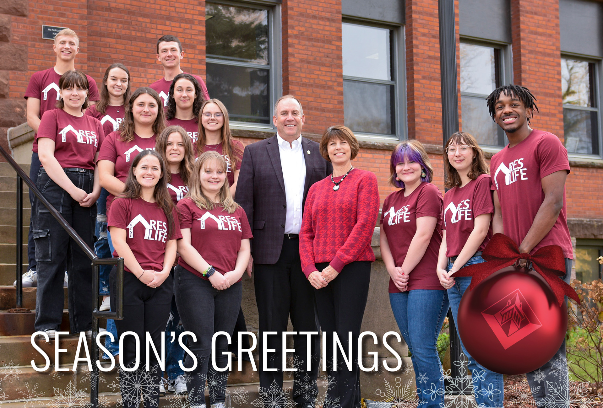 President LaFave and wife Kari stand with VCSU's Resident Assistants in front of McFarland Hall