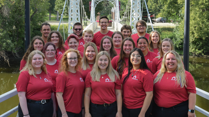 Residence Life Staff posing on the walkbridge