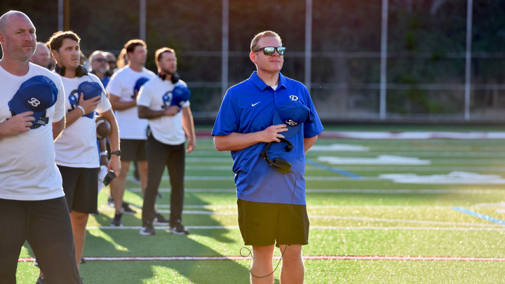 Scott Enyeart standing on sidelines