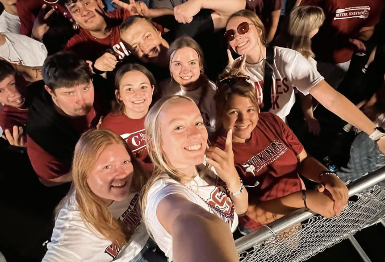 Sarah and her friends at a football game